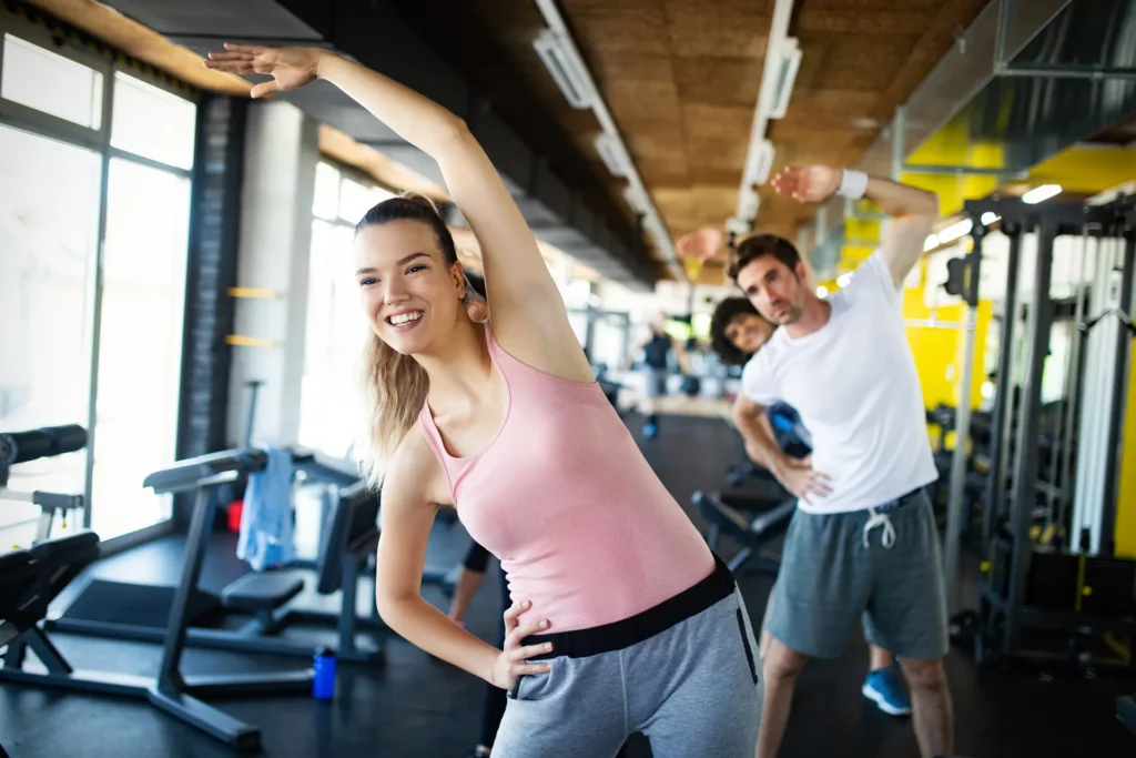 group of young people doing exercises in gym 2023 11 27 05 15 49 utc